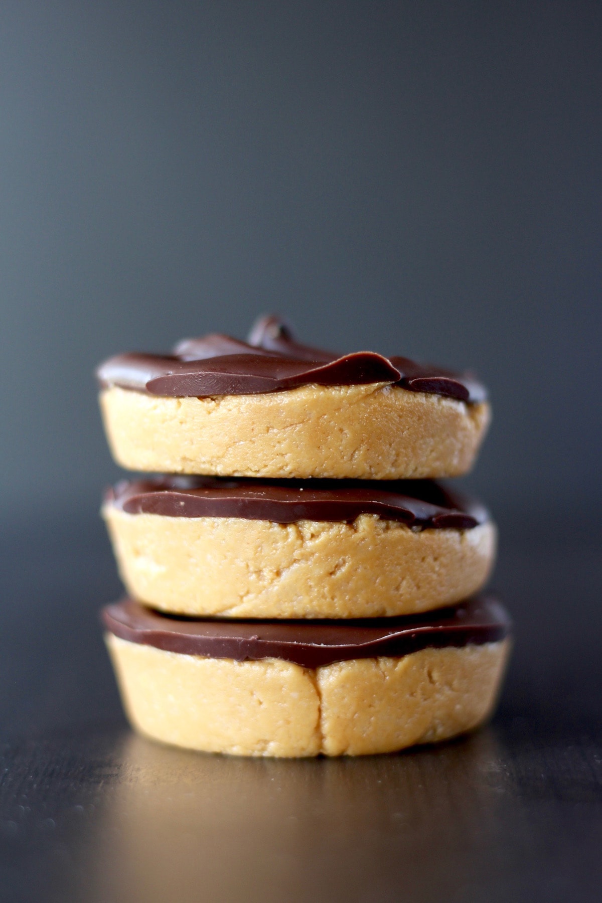 Three vegan peanut butter cups stacked on each other