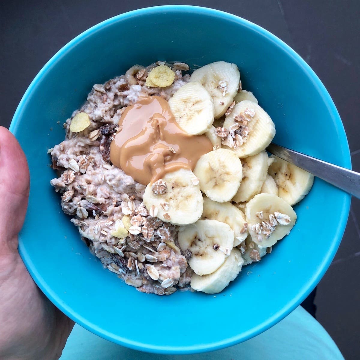 muesli soaked in almond milk with some banana and peanut butter