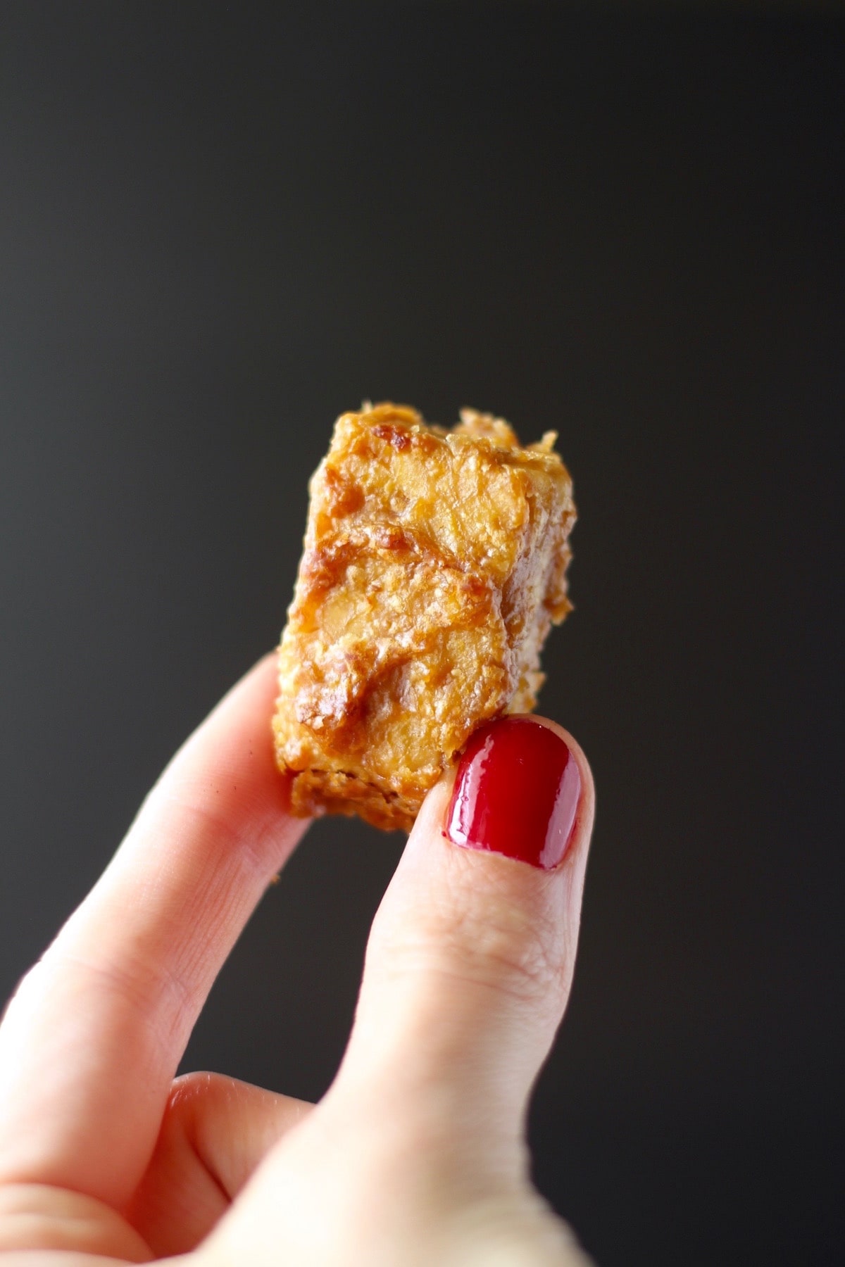 A golden brown baked tempeh bite