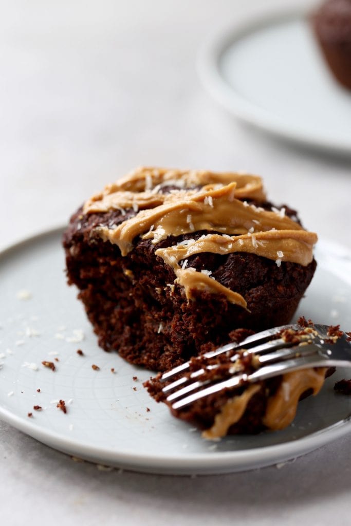 a jumbo chocolate breakfast muffin drizzled with peanut butter