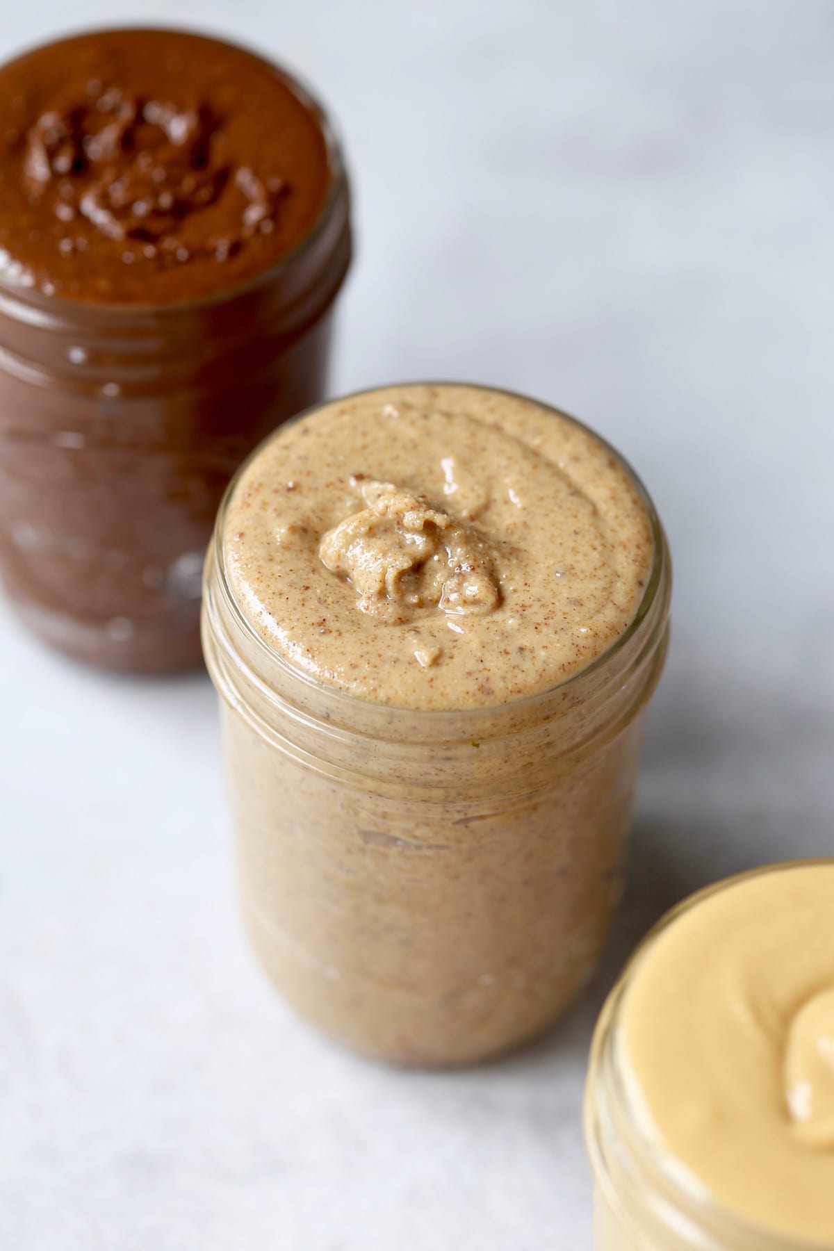 homemade cinnamon peanut butter in a mason jar