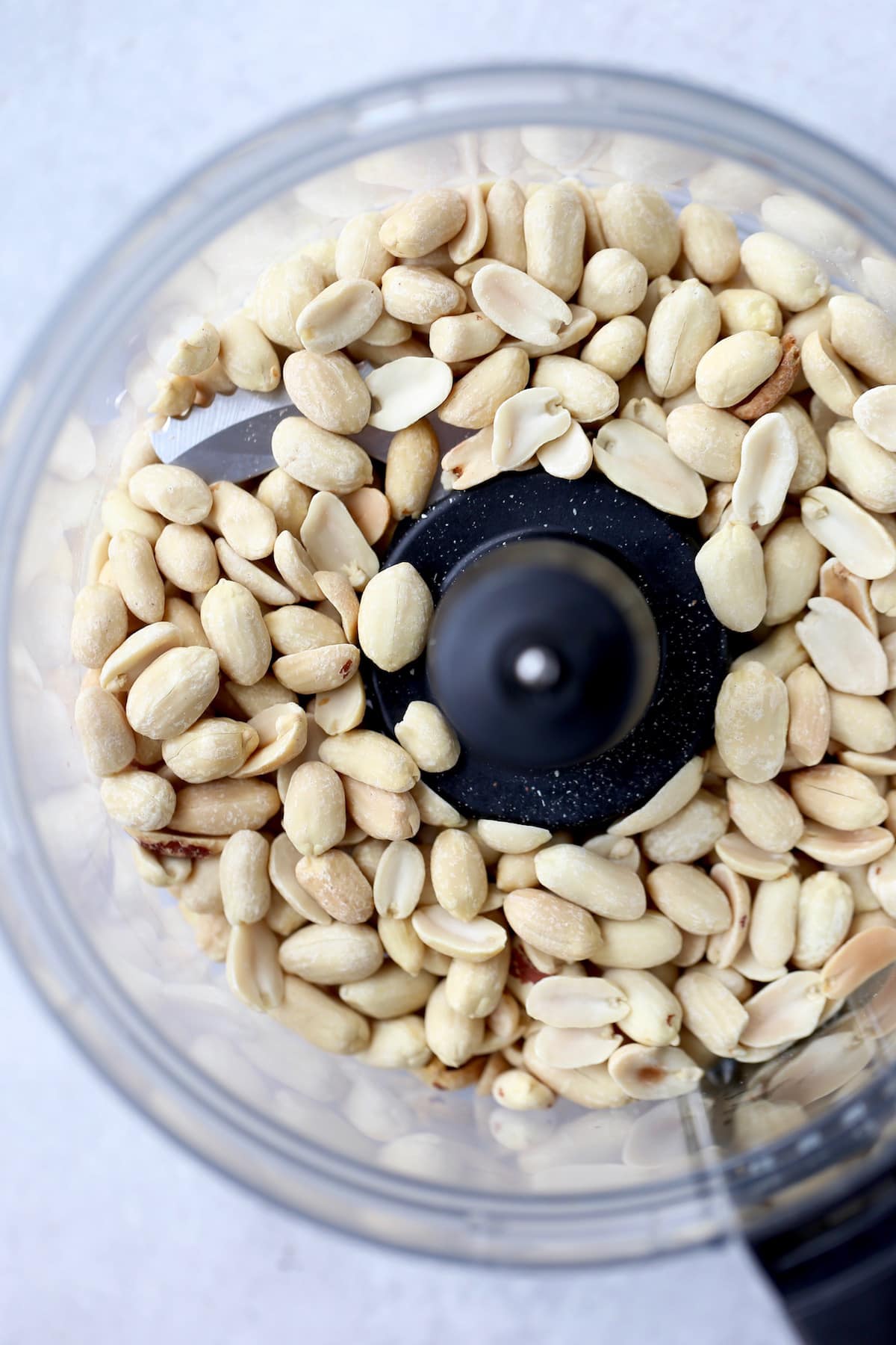 roasted peanuts in a food processor