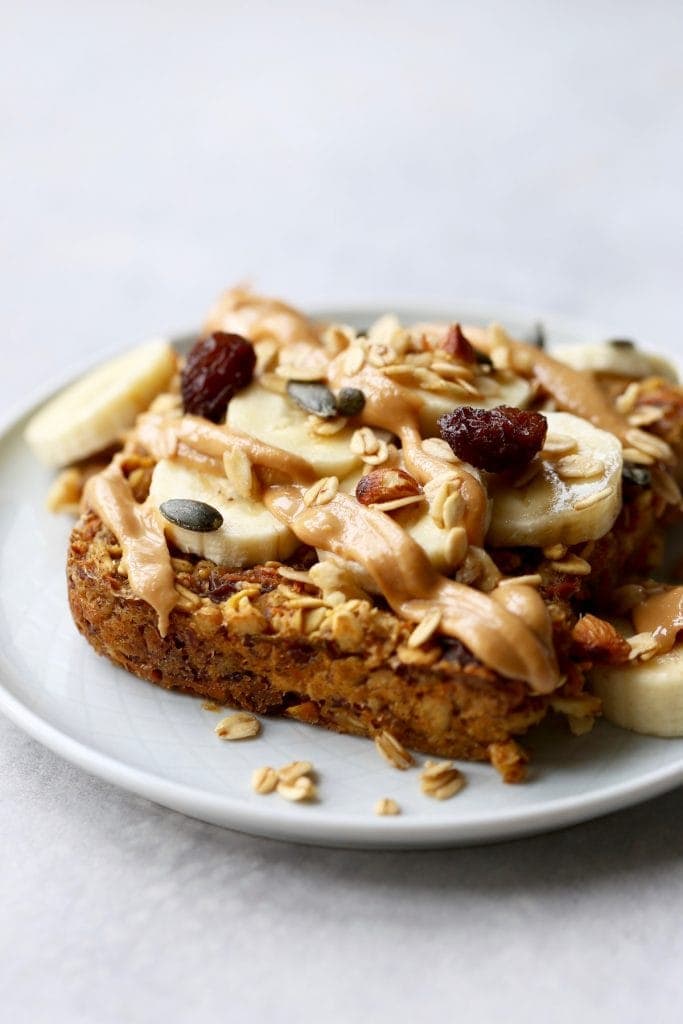 Carrot cake baked oatmeal drizzled with peanut butter