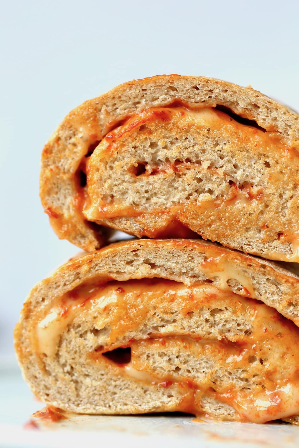 a closeup of cheesy pizza bread