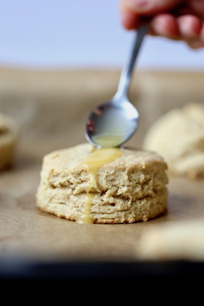 a vegan biscuit drizzled with butter