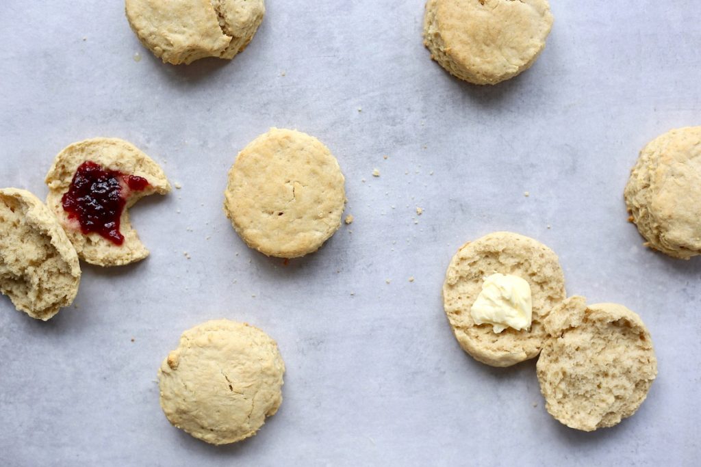 vegan biscuits topped with butter and jam