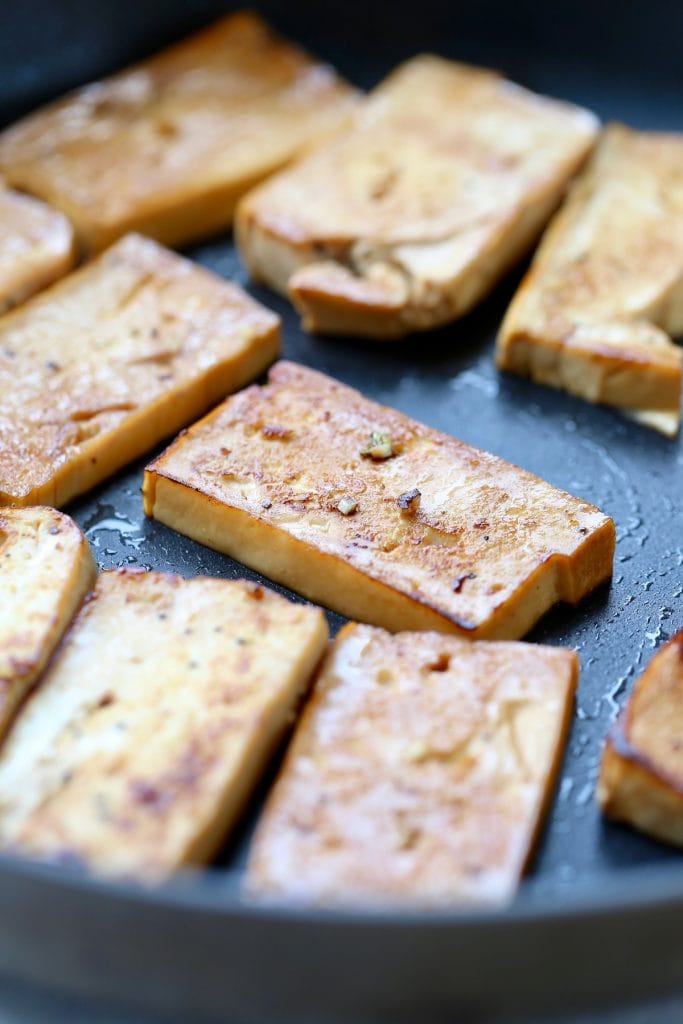 easy marinated tofu cooking in a frying pan