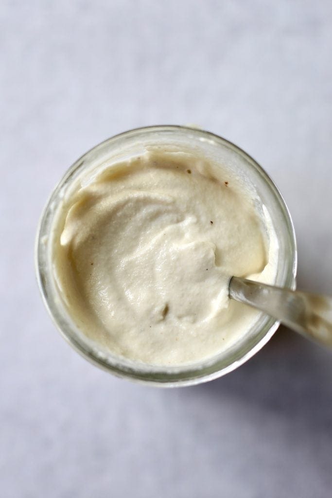 Vegan Sour Cream in mason jar with spoon