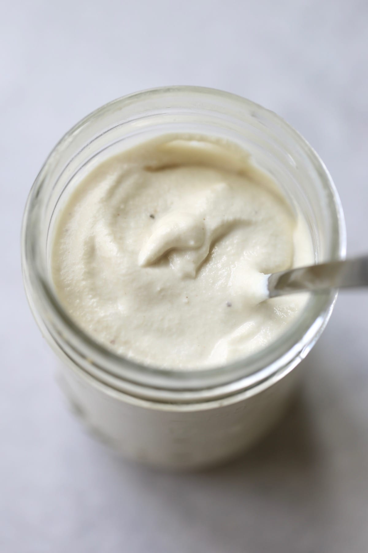 creamy cashew sour cream in a mason jar