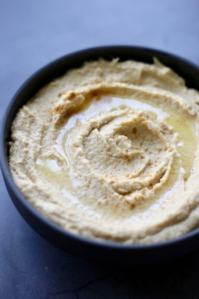 creamy hummus drizzled with olive oil
