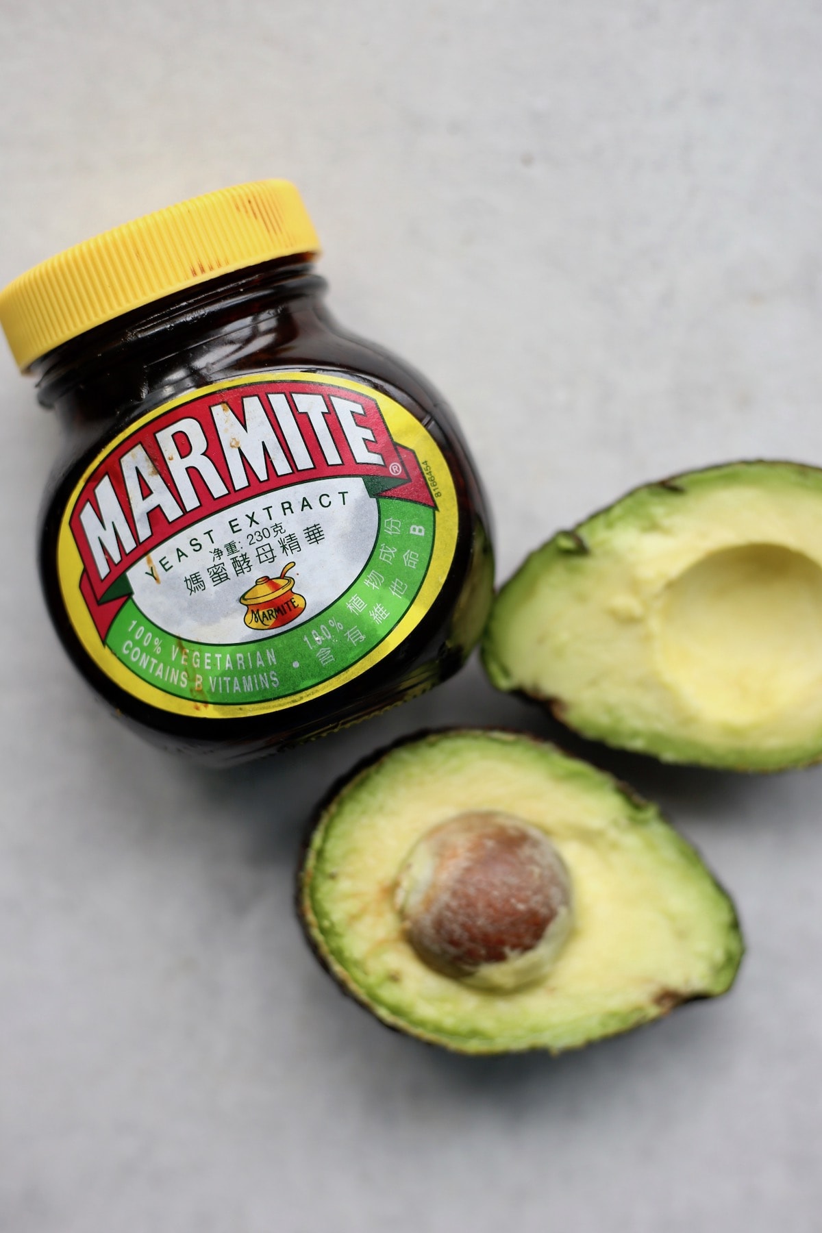 Marmite and an sliced in half avocado