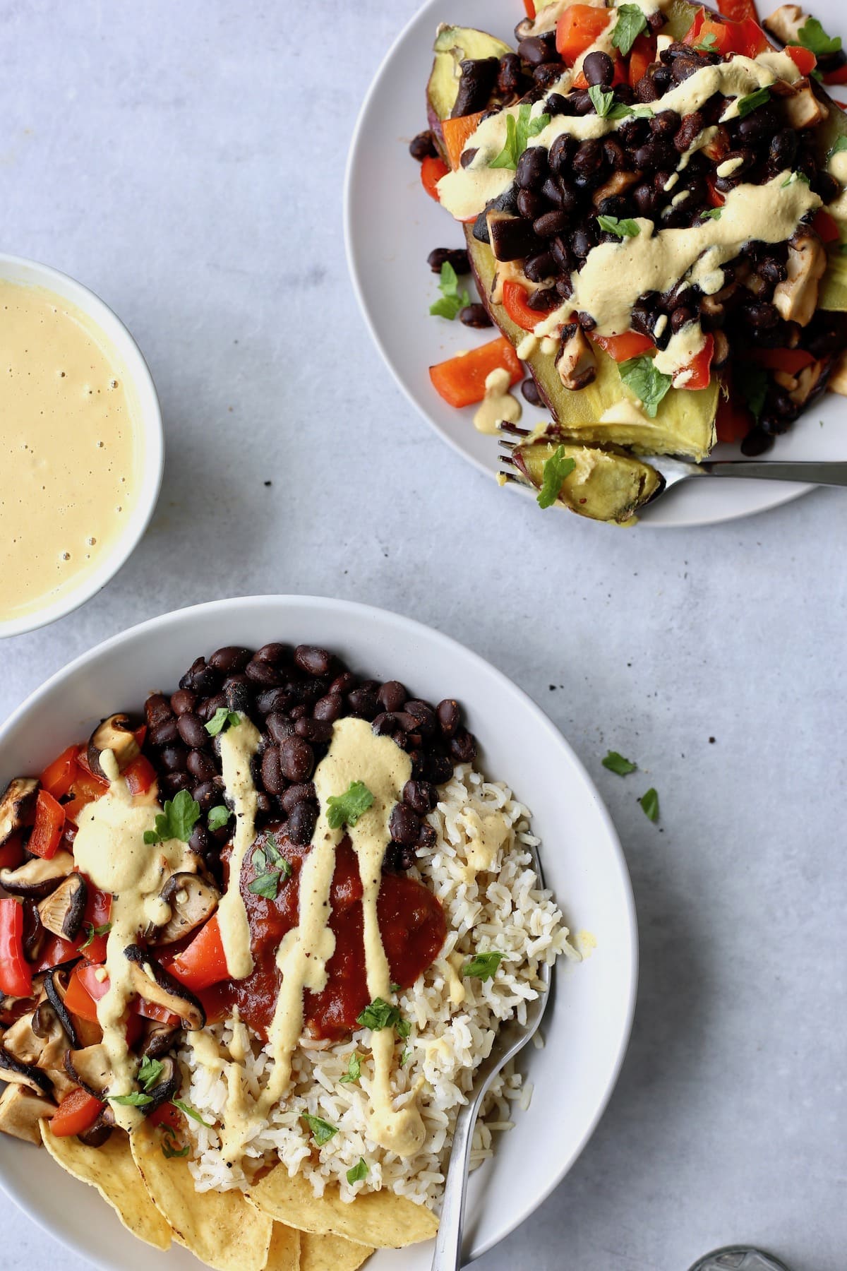 vegan nacho cheese drizzled over mexican buddha bowls