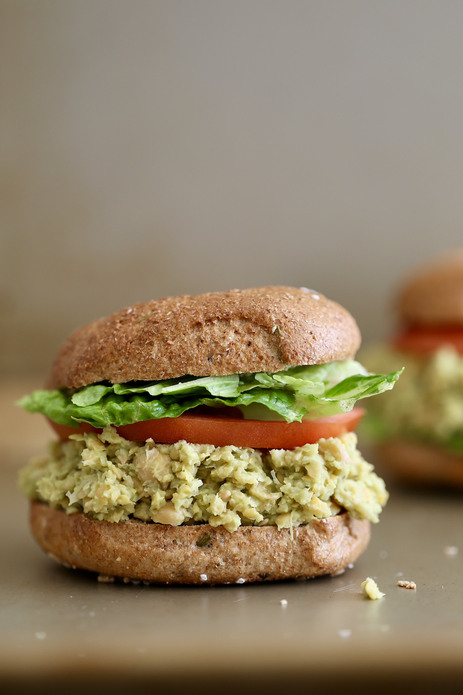 Vegan avocado chickpea salad bagel sandwich