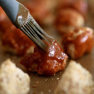 Cauliflower Wings being coated in BBQ sauce