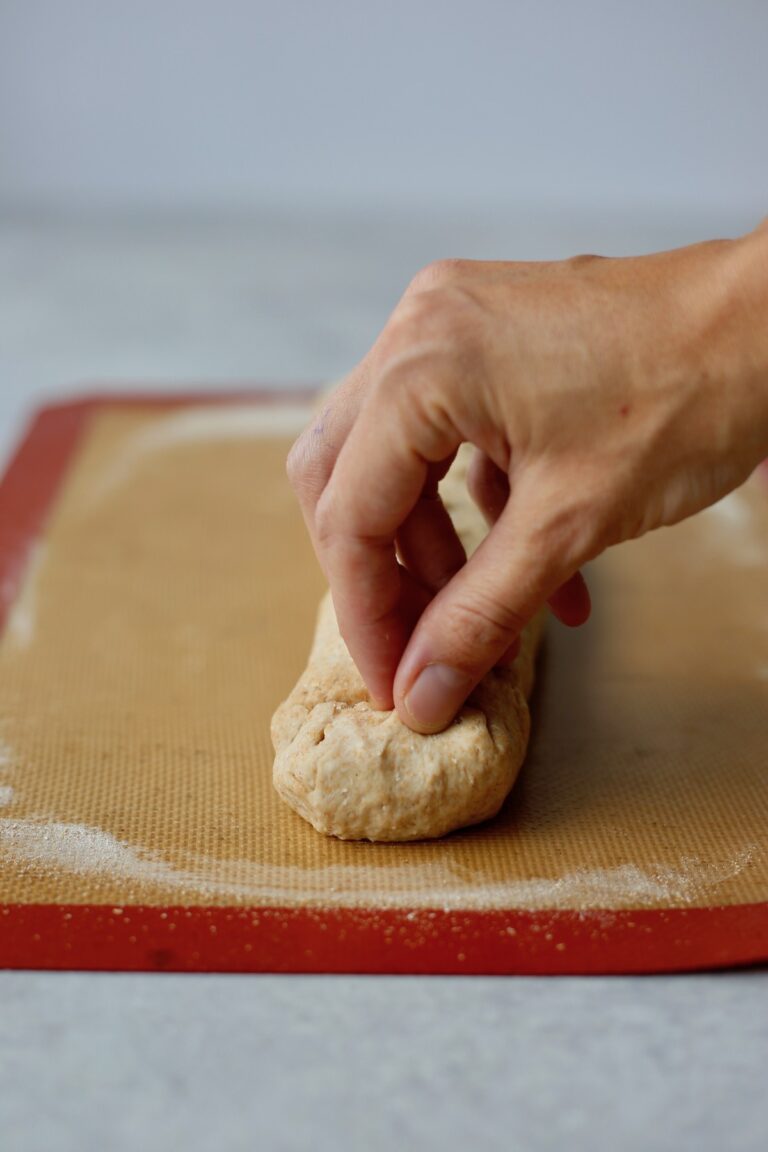 pinch the ends of the dough roll