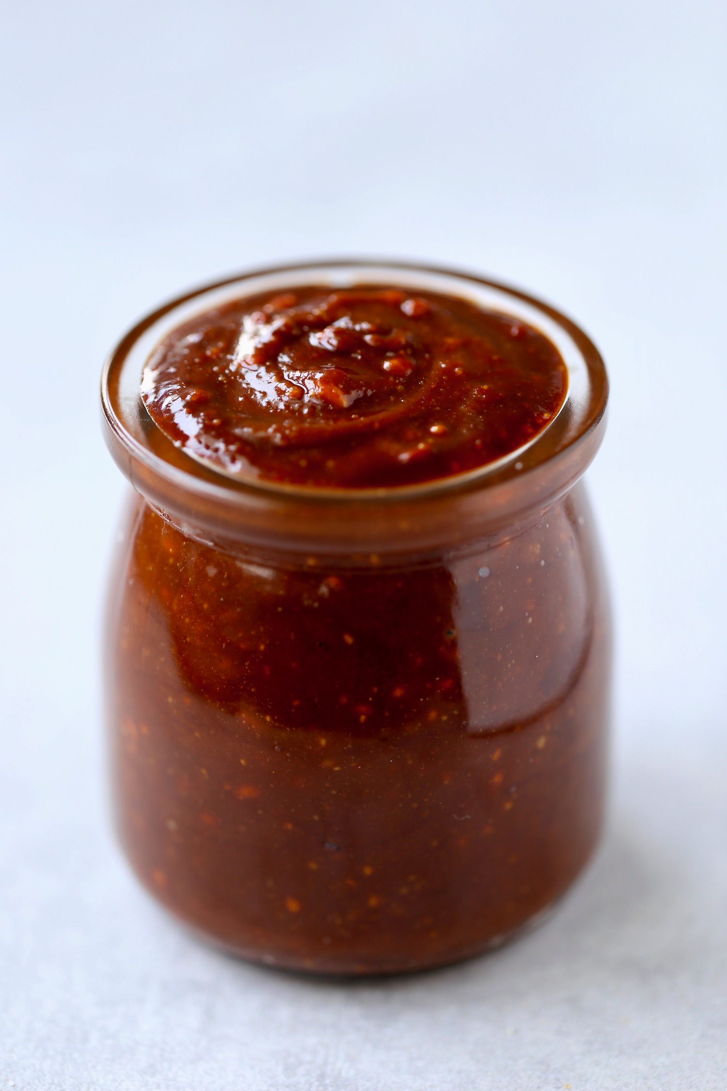 thick and creamy peanut satay sauce in a glass jar