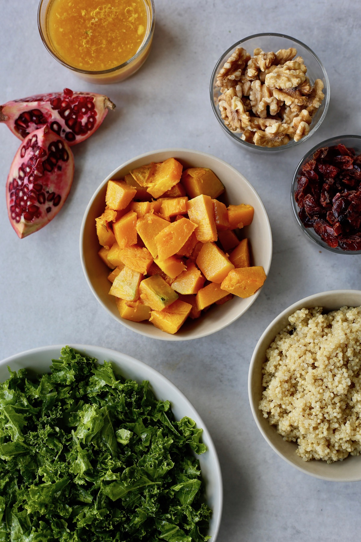 The ingredients you'll need for quinoa, kale and squash salad laid out on a table