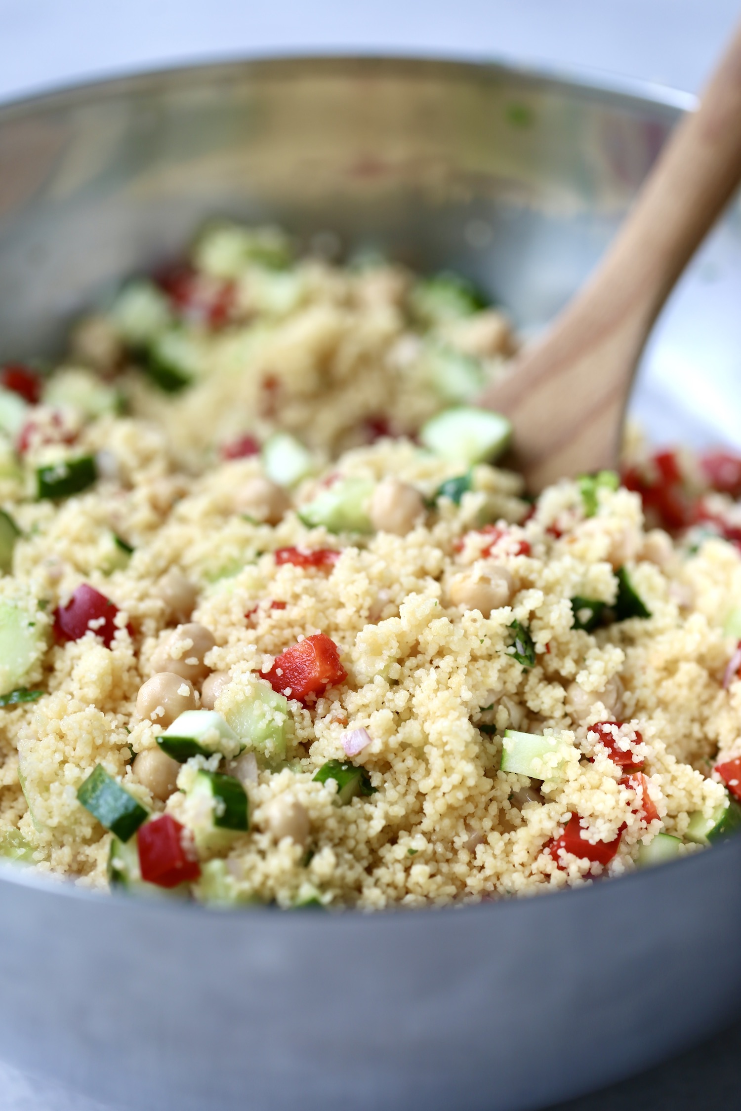 a large serving bowl of simple lemon couscous salad