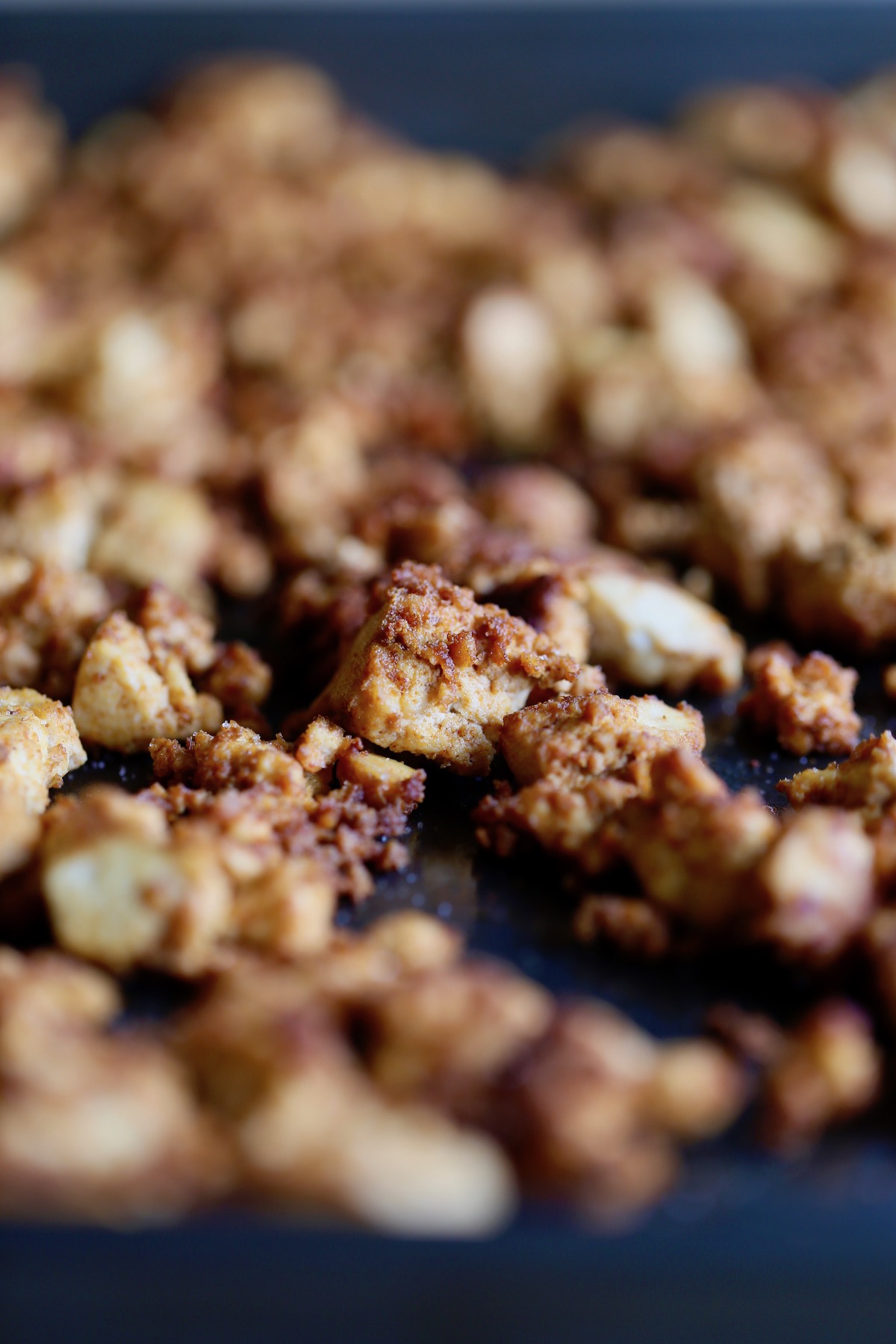 baked taco tofu crumbles on a baking sheet 