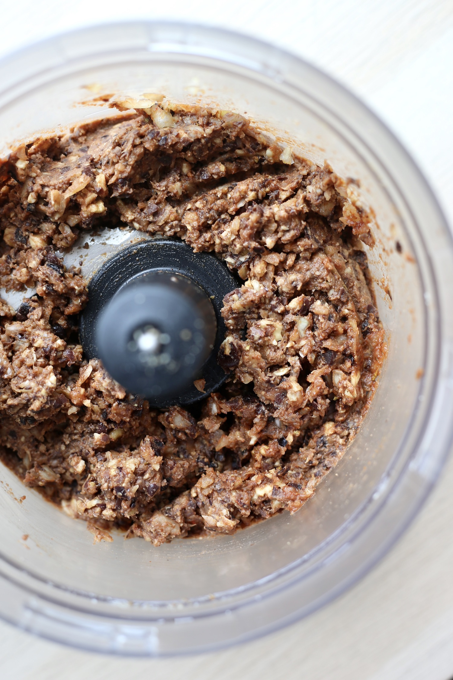 Walnuts, black beans and spices pulsed to combine in a food processor to make vegan walnut taco meat. 