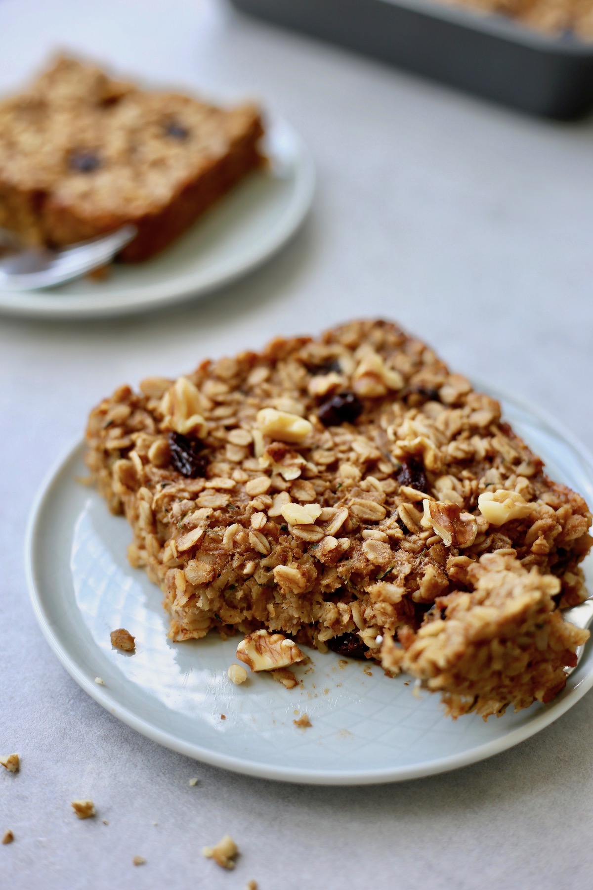 zucchini bread baked oatmeal being eaten off a plate